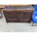 A GEORGE III OAK BLANKET CHEST WITH TWO DRAWERS TO THE BASE AND FOUR PANEL FRONT, 55" WIDE