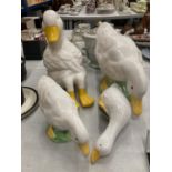 FOUR CERAMIC DUCK FIGURES OF GRADUATING SIZES