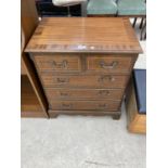 A REPRODUCTION MAHOGANY AND CROSS BANDED CHEST OF TWO SHORT AND THREE LONG DRAWERS 24.5" WIDE