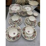 A QUANTITY OF CROWN STAFFORDSHIRE FLORAL TEA WARE TO INCLUDE CUPS, SAUCERS, JUGS, PLATES AND SUGAR