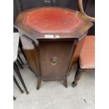 AN ANTIQUE STYLE OCTAGONAL DRINKS CABINET WITH INSET LEATHER TOP, 19" WIDE