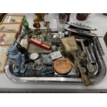 A SILVER PLATED TRAY CONTAINING A VARIETY OF COLLECTABLES TO INCLUDE TIN PLATE TOYS, MIRROR AND