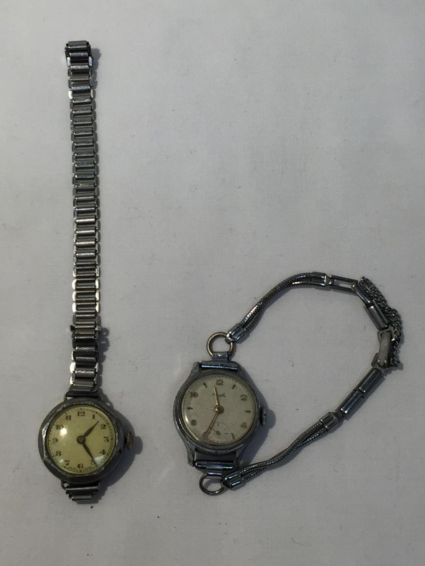 TWO WWI TRENCH WATCHES SEEN WORKING BUT NO WARRANTY