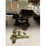 A PAIR OF VINTAGE CAST SCALES WITH WEIGHTS, PLUS A BRASS BEER? TAP