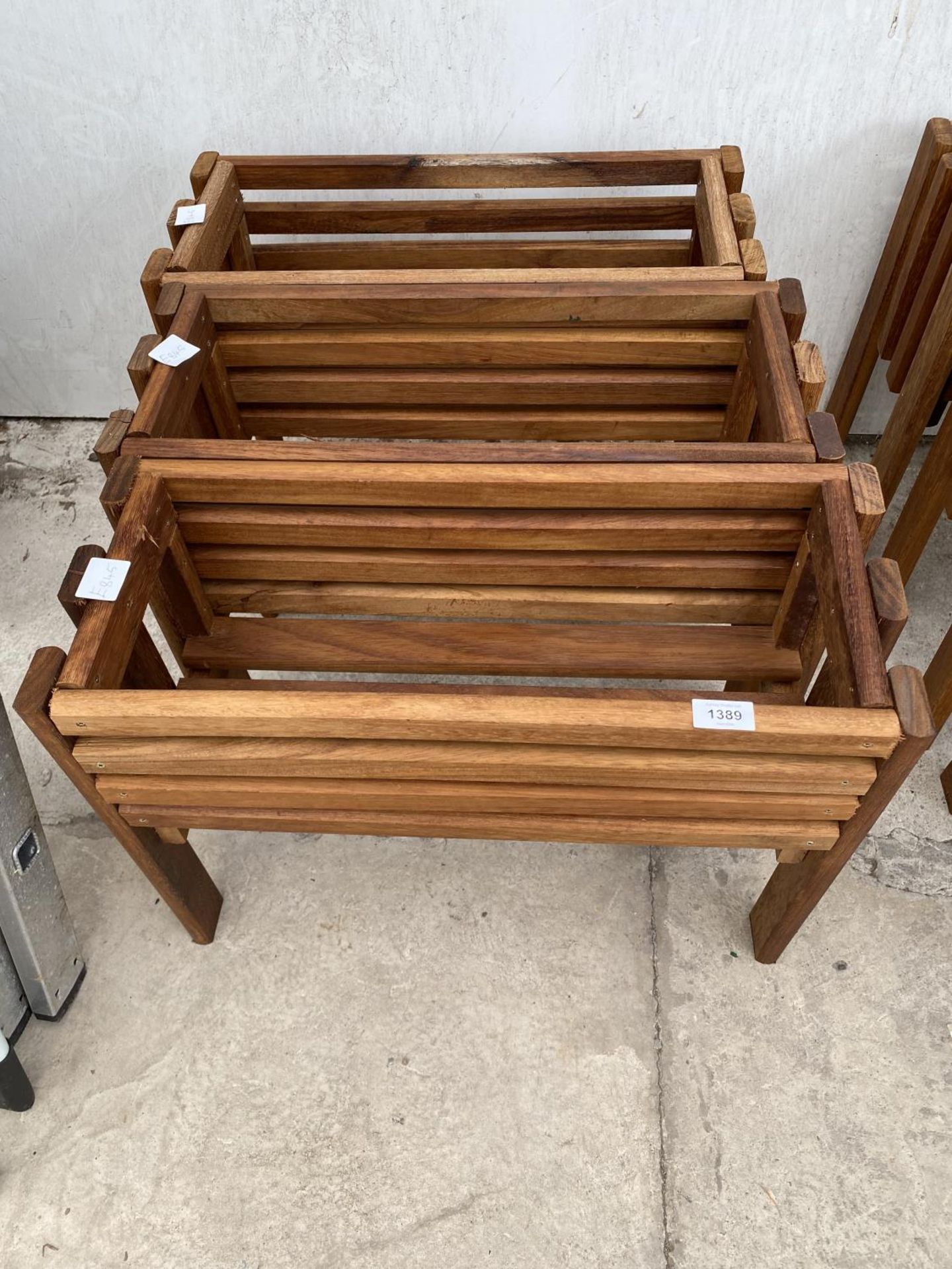 THREE WOODEN TROUGH PLANTER STANDS