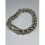 A WHITE METAL SKULL BRACELET