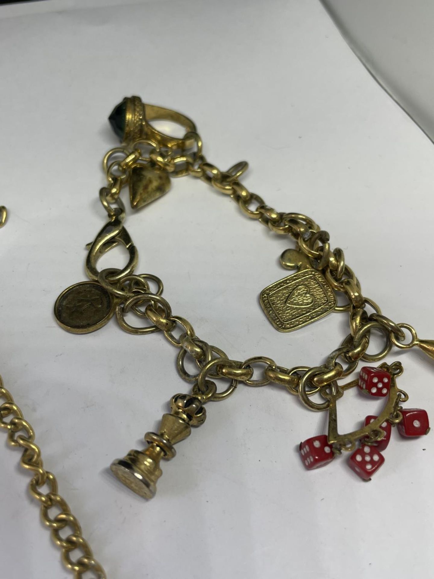 TWO YELLOW METAL BRACELETS TO INCLUDE ONE WITH EIGHT CHARMS - Image 3 of 3