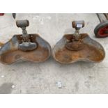 A PAIR OF GALVANISED KIDNEY SHAPED WATER TROUGHS