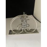 A CONTINENTAL SILVER WINDMILL LETTER RACK