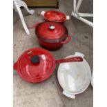 FOUR CAST IRON COOKING POTS TO INCLUDE A KUHN RIKON TWIN HANDLED POT AND AN ACASA KITCHEN LIDDED