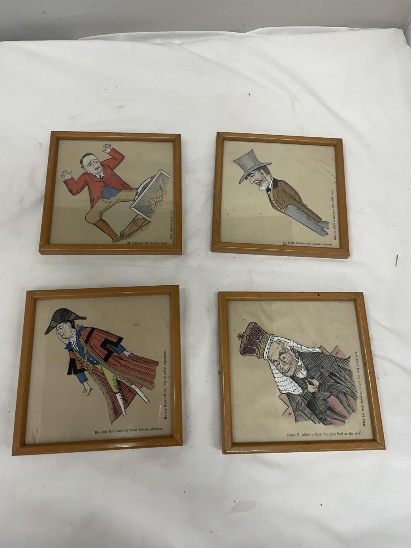 A SET OF FOUR VICTORIAN CARICATURES ON CLOTH 15.5CM X 15.5CM