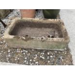 A STONE TROUGH 75CM X 44CM