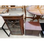 A 19TH CENTURY STYLE ASTRAGAL GLAZED CORNER CUPBOARD WITH SHAPED INTERIOR SHELVES AND DENTIL