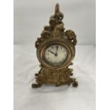 AN ORNATELY DECORATED BRASS MANTLE CLOCK HEIGHT 28CM