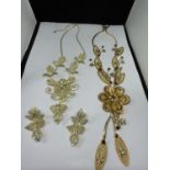 TWO COSTUME JEWELLERY NECKLACES ONE WITH MATCHING EARRINGS