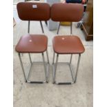 A PAIR OF CHROME FRAMED KITCHEN STOOLS