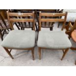 A PAIR OF RETRO TEAK DINING CHAIRS