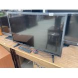 A BLAUPUNKT 32" TELEVISION WITH REMOTE CONTROL
