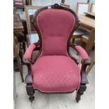 A VICTORIAN MAHOGANY OPEN ARM EASY CHAIR