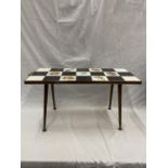 A 1960'S RETRO CHESS BOARD STYLE TILED TABLE (HANDLE A/F)