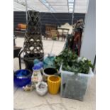 AN ASSORTMENT OF GLASS AND CERAMIC PLANTERS AND VASES