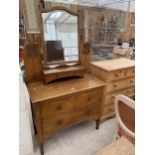 AN OAK ARTS & CRAFTS DRESSING CHEST WITH TWO DRAWERS TO THE BASE AND TWO JEWELLERY DRAWERS, 39" WIDE