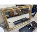 A MODERN GILT FRAMED ARQUATI WALL MIRROR, 42X30"