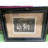 A FRAMED VINTAGE PHOTOGRAPH OF A WEDDING