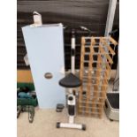 A THIRTY THREE BOTTLE METAL AND WOOD WINE RACK, AN EXERCISE BIKE AND WALLMOUNTED BATHRRON SINK