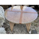 A WICKER PATIO TABLE WITH GLASS TOP, 42" DIAMETER