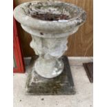 A RECONSTITUTED STONE URN PLANTER WITH PLINTH BASE (H:65CM)