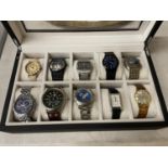 TWELVE VARIOUS WATCHES IN A PRESENTATION BOX TO INLCUDE TWO SKAGEN, A JAGUAR, DKNY ETC
