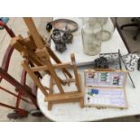 AN ARTISITS EASEL AND A PART PAINT SET
