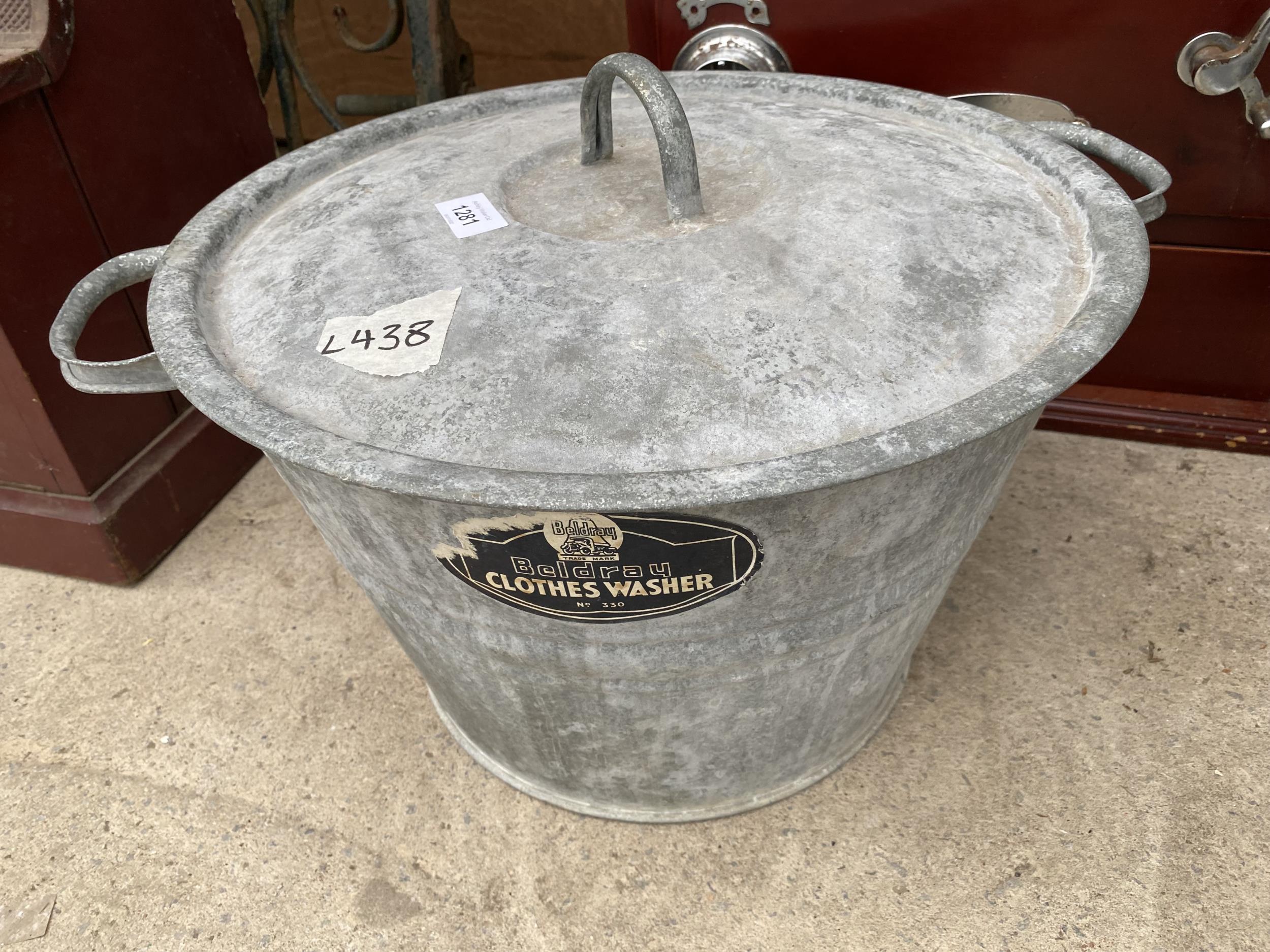 A LARGE GALVANISED LIDDED COOKING POT