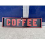 A WOODEN PAINTED COFFEE SIGN