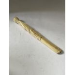 A VINTAGE CARVED BONE CHEROOT HOLDER