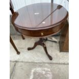 A SMALL MAHOGANY TABLE, 21" DIAMETER ON TRIPOD BASE WITH TWO DRAWERS, COMPLETE WITH ORIGINAL RECEIPT