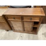 A MARKS & SPENCER KARINDA CONSOLE UNIT WITH TWO DRAWERS AND TWO SLIDING LOUVERED DOORS, 39" WIDE