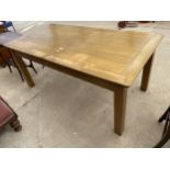 A MODERN OAK DINING TABLE ON SQUARE LEGS, 71X36"