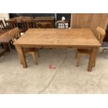 A MODERN PINE KITCHEN TABLE 71" X 40" AND TWO CHAIRS