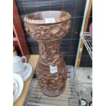 A LARGE TREEN HEAVILY CARVED VASE