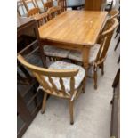 A MODERN PINE KITCHEN TABLE ON TURNED LEGS, 48X30" AND FOUR CHAIRS