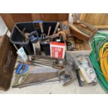 AN ASSORTMENT OF VINTAGE TOOLS TO INCLUDE SAWS AND A COBBLERS LAST ETC