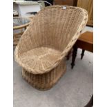 A MODERN WICKER BEDROOM CHAIR