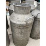 A VINTAGE MILK CHURN