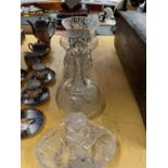 A QUANTITY OF LEAD CUT CRYSTAL GLASS TO INCLUDE DECANTERS, BOWLS AND A BASKET