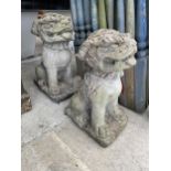 A PAIR OF CONCRETE CHINESE DRAGON ORNAMENTS