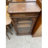 A VICTORIAN WALNUT AND INLAID MUSIC CABINET WITH GLASS DOOR, BEARING LABEL 'WALTER CARTER