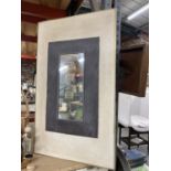 AN OBLONG MIRROR WITH A SLATE INNER 30 X 18 CM