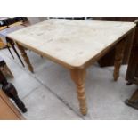 A VICTORIAN STYLE PINE KITCHEN TABLE ON TURNED LEGS, 60X35"